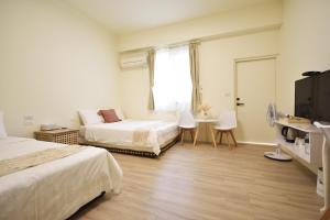 Postel nebo postele na pokoji v ubytování W-travel