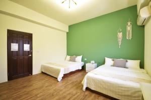 Postel nebo postele na pokoji v ubytování W-travel
