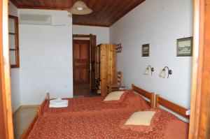 Posteľ alebo postele v izbe v ubytovaní Arpyia