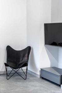 TV a/nebo společenská místnost v ubytování Villa Valdés-Un lugar idílico,cerca de la costa
