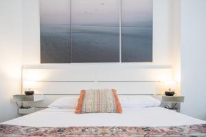 Postelja oz. postelje v sobi nastanitve Apartamento El Anteojo de Cádiz