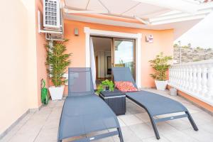 A balcony or terrace at Amazing Duplex with panoramic ocean views