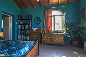Postel nebo postele na pokoji v ubytování Strongilos Homestay