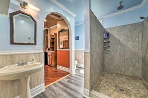a bathroom with a sink and a shower at Sault Ste Marie Historic Home, Walk to Town! in Sault Ste. Marie +27 photos