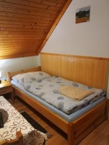 En eller flere senge i et værelse på Pod palmou Gerlachov
