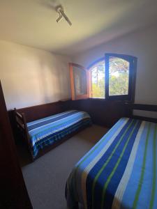 Tempat tidur dalam kamar di Casa do sol