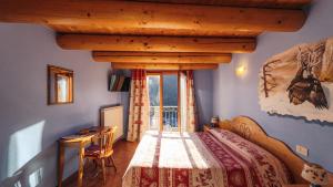 Postel nebo postele na pokoji v ubytování Agriturismo Belotti
