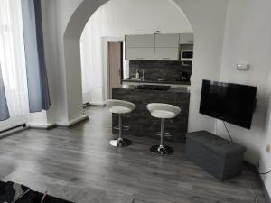 Kuchyňa alebo kuchynka v ubytovaní Apartmán U kostela