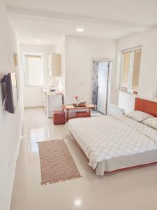 Postelja oz. postelje v sobi nastanitve Apartments Three Ohrid
