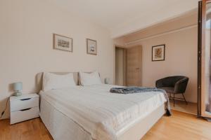 Postel nebo postele na pokoji v ubytování Apartments Ivana