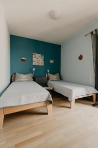 Postel nebo postele na pokoji v ubytování Apartments Ivana