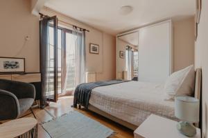 Postel nebo postele na pokoji v ubytování Apartments Ivana