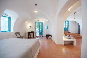 Santorinio Yellow House 객실 침대