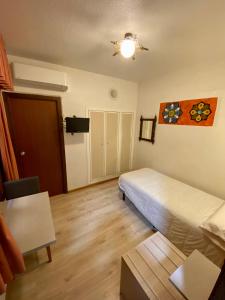 Postel nebo postele na pokoji v ubytování Hotel Real Castellon