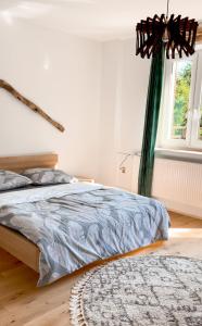 Posteľ alebo postele v izbe v ubytovaní Bieszczady Guest House