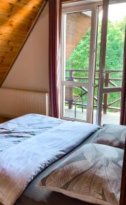 Posteľ alebo postele v izbe v ubytovaní Bieszczady Guest House