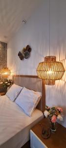 Posteľ alebo postele v izbe v ubytovaní Costa ANASTASIA_sea view suites