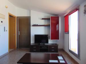 A television and/or entertainment centre at Penthouse overlooking Cuenca