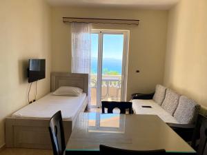 Giường trong phòng chung tại OniRana Apartments