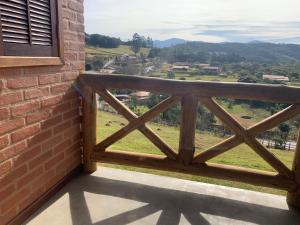 صورة لـ chalés Roma في سانتو أنطونيو دو بينهال