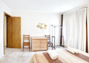 Hotel Mandarinebi客房内的一张或多张床位