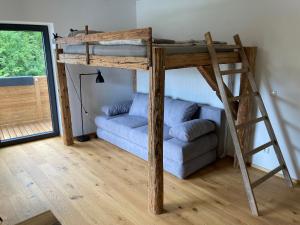 Posteľ alebo postele v izbe v ubytovaní Neue Wohnung "RITTERTAL" im Zentrum von Altmünster am Traunsee