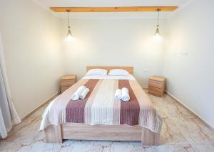 Hotel Mandarinebi客房内的一张或多张床位