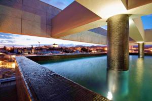 a view of a bridge over a river at Octant Ponta Delgada in Ponta Delgada +37 photos