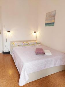 Posteľ alebo postele v izbe v ubytovaní Genova Rooms Brignole D