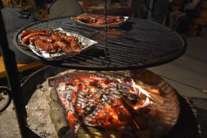 a grill with two trays of food on it at Pokoje Gościnne Budzowie in Czarna Góra +77 photos