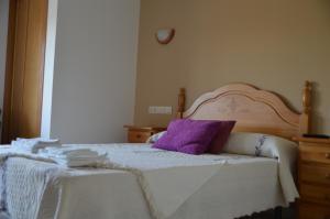 Łóżko lub łóżka w pokoju w obiekcie Casa de Conde