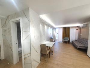 Posezení v ubytování SALOU ,APARTAMENTO CON PISCINA y Wifi + 37 fotografií