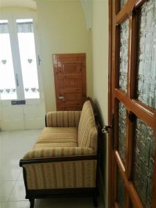 A seating area at L 'Alcova Holidays Home CENTRO STORICO