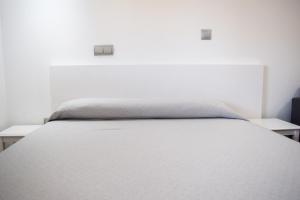 Posteľ alebo postele v izbe v ubytovaní Hotel Mirablau