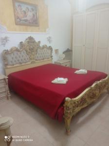 Säng eller sängar i ett rum på Riva del mare