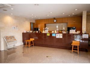 a waiting room with a counter and two chairs at AZ INN HANDA INTER - Vacation STAY 69371v in Handa +60 photos