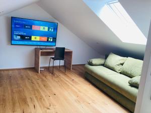 TV a/nebo společenská místnost v ubytování Rittertal