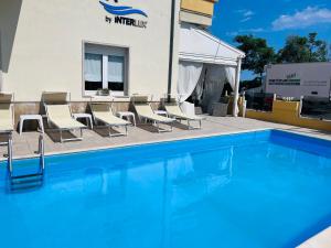 Bazén v ubytování Hotel Costazzurra by Interlux nebo v jeho okolí