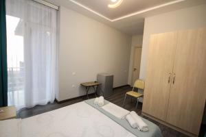 Postel nebo postele na pokoji v ubytování Guest House 99