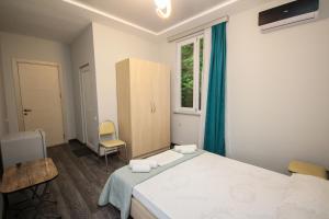 Postel nebo postele na pokoji v ubytování Guest House 99