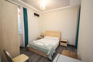 Postel nebo postele na pokoji v ubytování Guest House 99