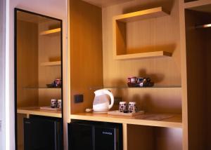 A kitchen or kitchenette at OQ STANDARD HOTEL - Airport