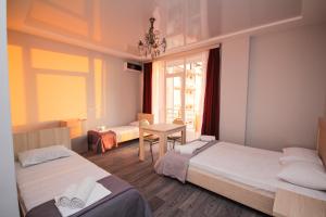 Postel nebo postele na pokoji v ubytování Guest House 99