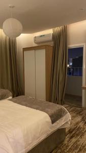 Кровать или кровати в номере Golden Andalus Hotel