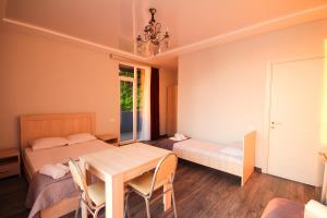 Postel nebo postele na pokoji v ubytování Guest House 99