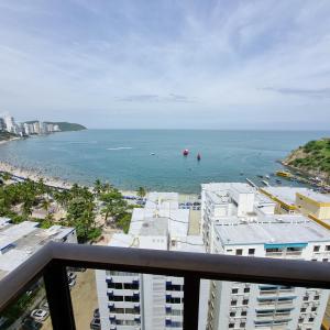 a view of the beach from the balcony of a building at apartamento-rodadero-laureles-1601 by reservastodo in Santa Marta