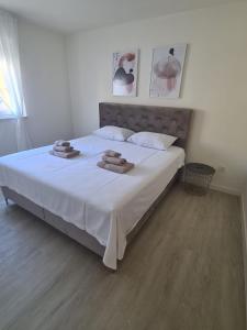 Posteľ alebo postele v izbe v ubytovaní Blue sky apartment
