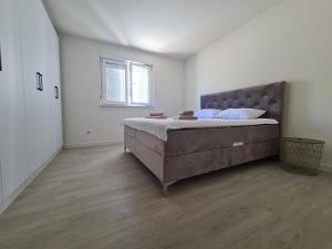 Posteľ alebo postele v izbe v ubytovaní Blue sky apartment