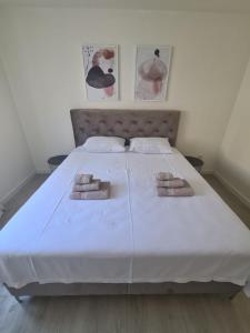 Posteľ alebo postele v izbe v ubytovaní Blue sky apartment