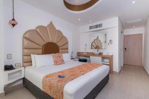 Postel nebo postele na pokoji v ubytování Hotel Cartagena Dubai